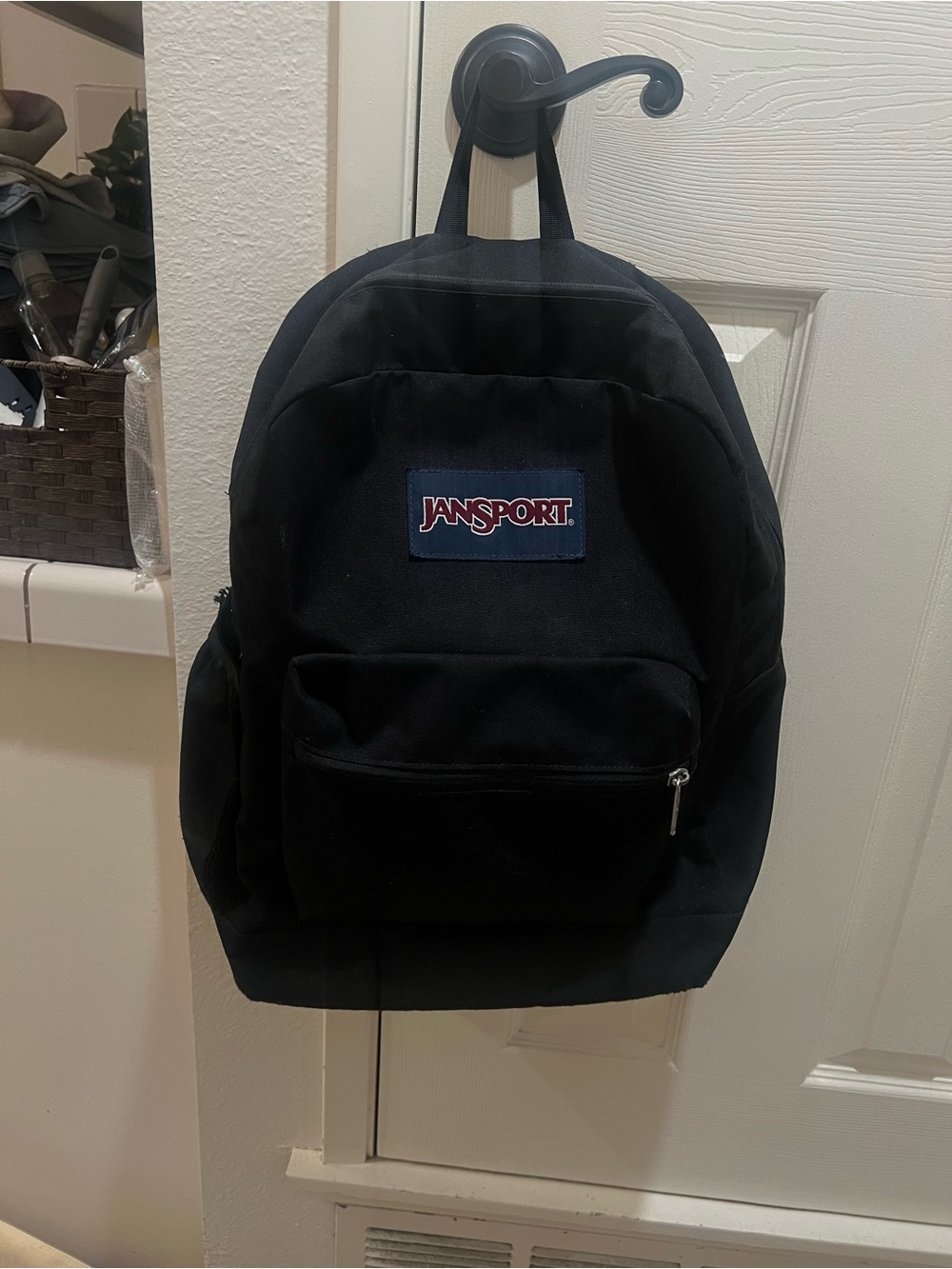 Jansport Black Backpack with Red and White Logo